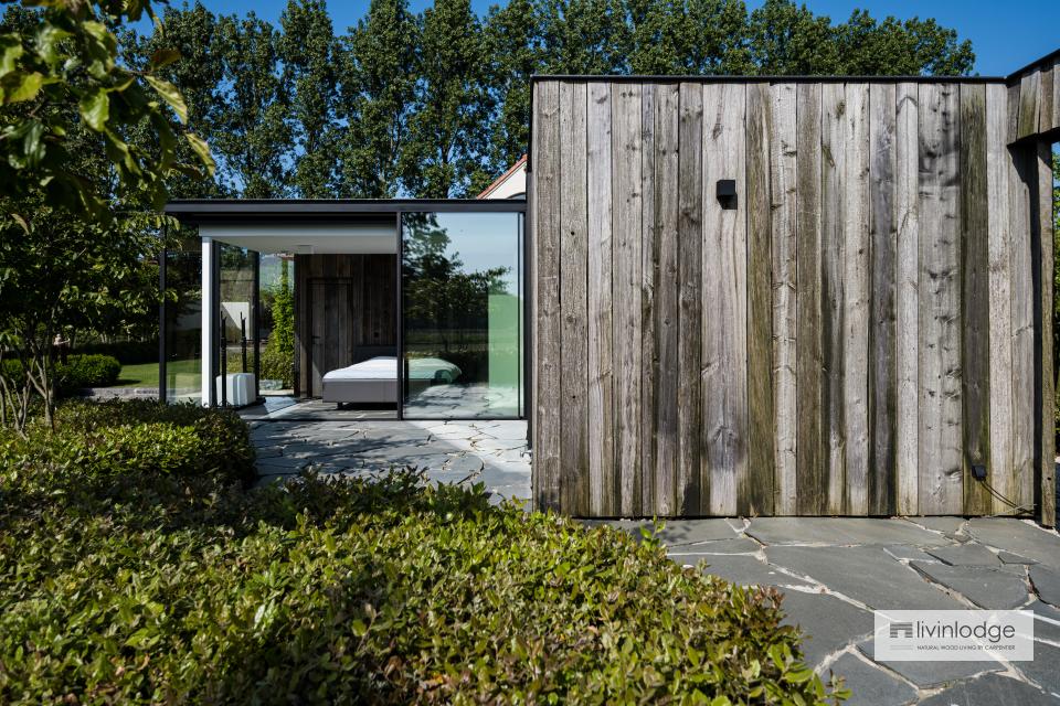 Luxe tuinkamer in barnwood en sliding glass